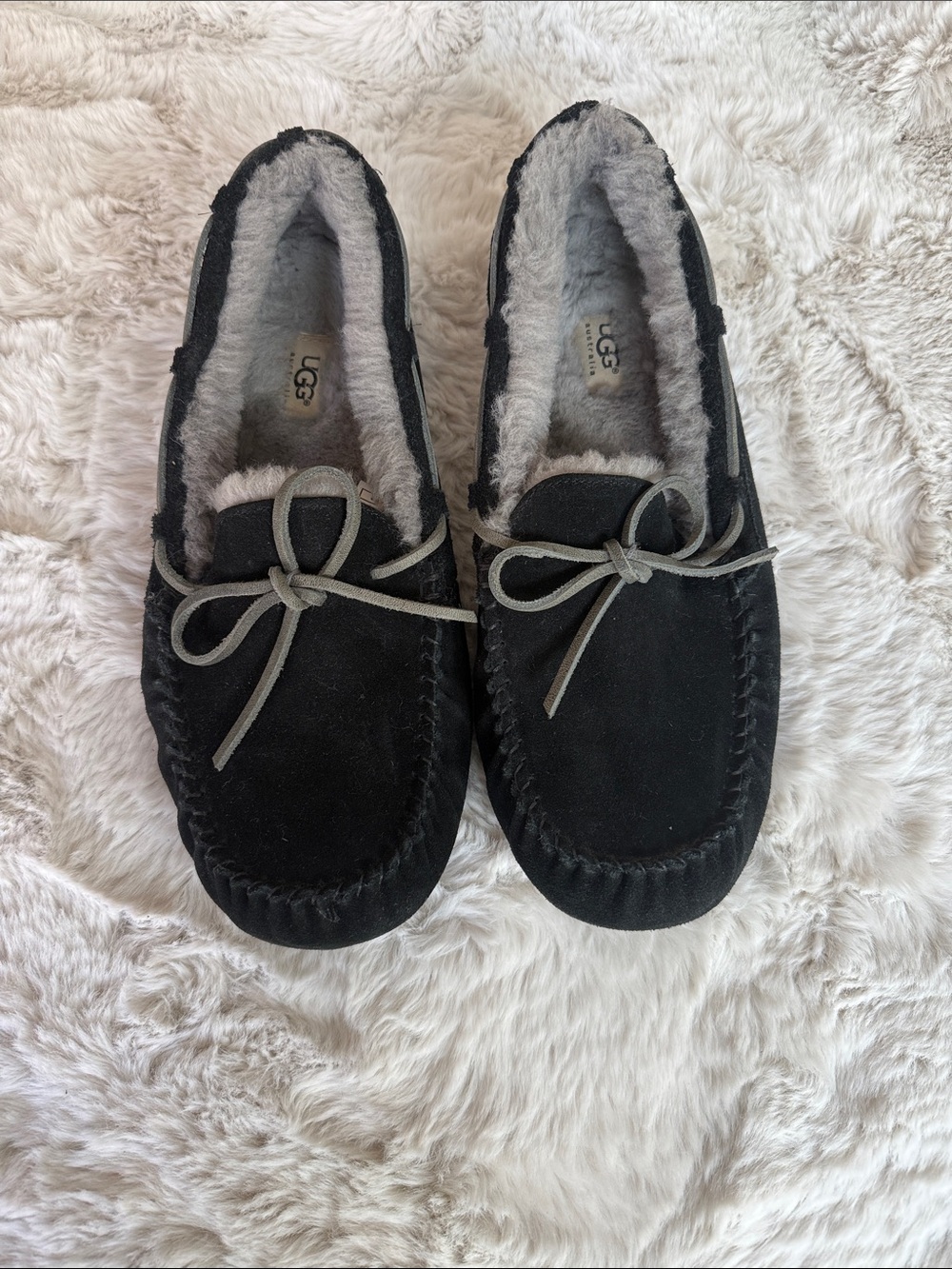 UGG Women's Black Suede Moccasin Slippers with Gray Bow